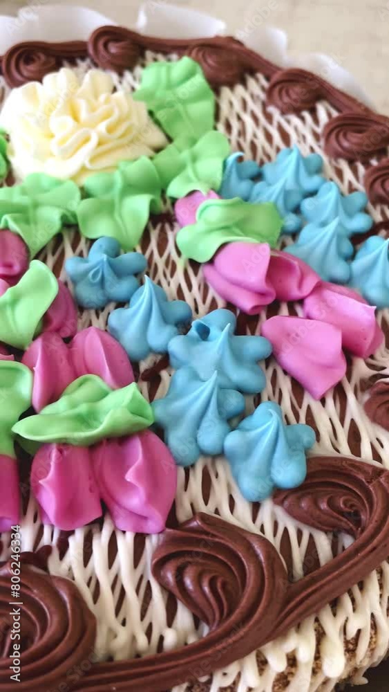 Cake with meringue, buttercream and nuts, close up, delicious cake decorated with buttercream flowers, Kyiv cake, confectionery Cake with meringue, buttercream and nuts, close up, delicious cake decorated with buttercream flowers, Kyiv cake, confectionery
