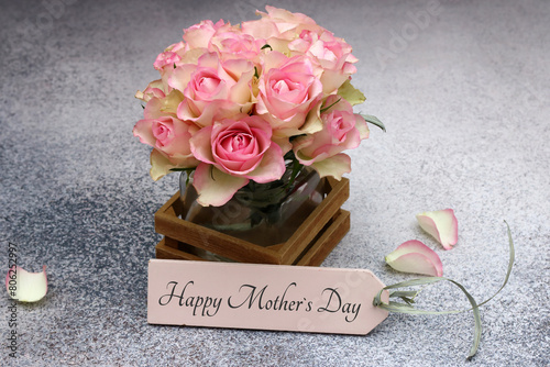 Greeting card for Mother's Day: Vase with roses and the text Happy Mother's Day.