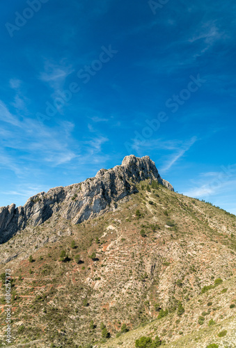 Beautiful Benicadell mountain in the morning with a blue sky, in Alicante province, Spain