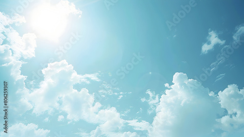 Bright blue sky with fluffy clouds and a flock of birds soaring, bathed in sunshine.