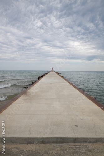 Light house warning tower on the breakwater wall