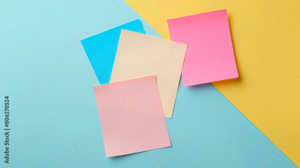 Colorful Note Papers on a Dual-Toned Blue and Yellow Background Colorful Note Papers on a Dual-Toned Blue and Yellow Background
