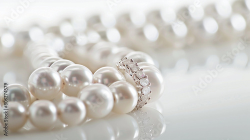Elegant Pearl Necklace with a Diamond Ring - A Symbol of Sophistication and Luxury