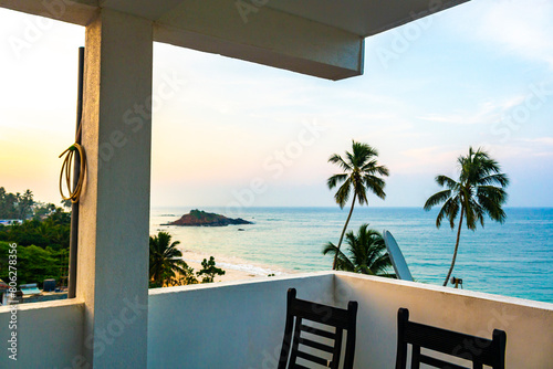 Beautiful paradise tropical beach waves palms Mirissa Beach Sri Lanka.