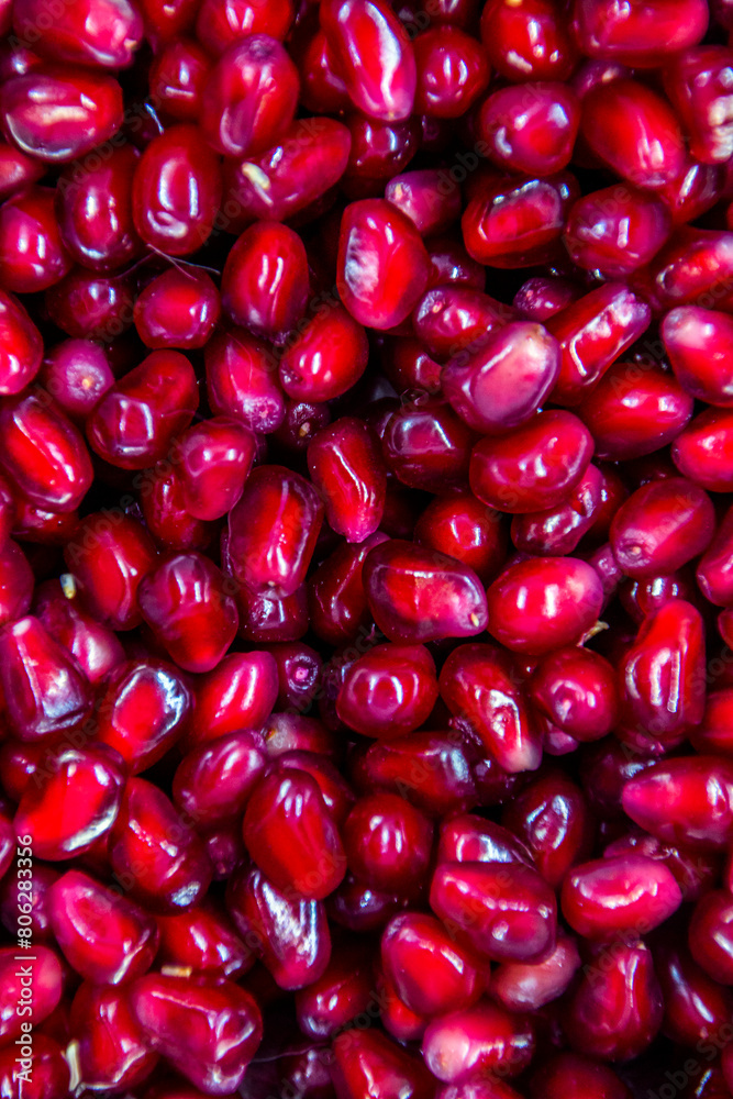 Red pomegranate seeds close up Red pomegranate seeds close up