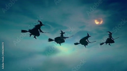 Witches Flying on Broomsticks in night a cloudy sky full moon, Halloween Background 4k High-Quality Animated video photo