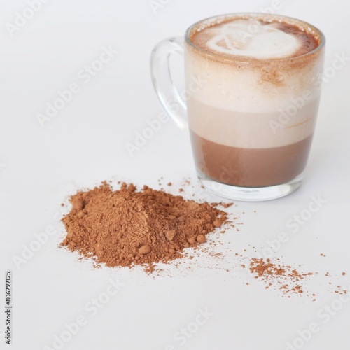 Handmade chocolate with glass of hot chocolate photo