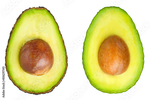 Sliced black and green avocado on an isolated white background.