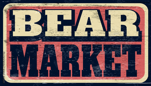 Aged and worn bear market sign on wood