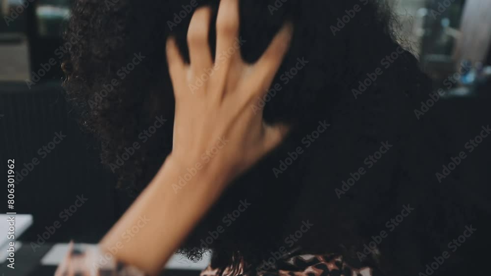 Close up of a woman twisting afro hair. Hair weaving Close up of a woman twisting afro hair. Hair weaving