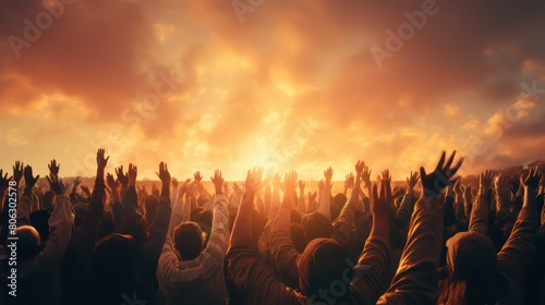 Silhouette of a group of people raising their hands at a music festival © Bilal