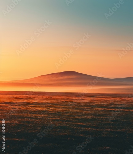 The sun sets over a vast plain