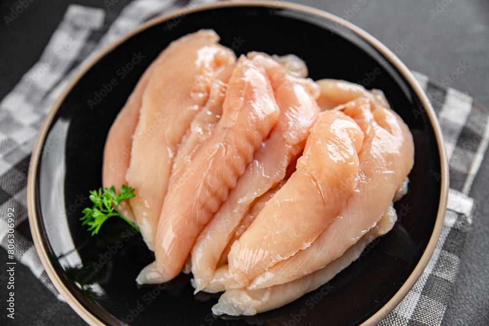 chicken meat raw aiguillettes fresh cooking meal food snack on the table copy space food background chicken meat raw aiguillettes fresh cooking meal food snack on the table copy space food background