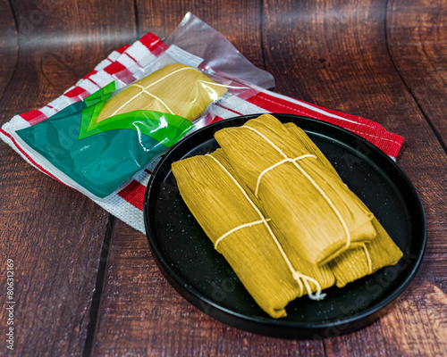 Εκτύπωση καμβά Peruvian sweet humitas, served in a porcelain dish, sweet humita inside a transparent bag