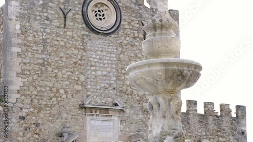 Wallpaper Mural Stunning aerial view of the historic Duomo di Taormina in Sicily, Italy. This iconic cathedral, surrounded by picturesque streets and vibrant architecture, captures the charm of Italian heritage. Torontodigital.ca