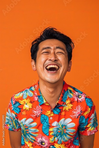 Close up portrait of a man laughing