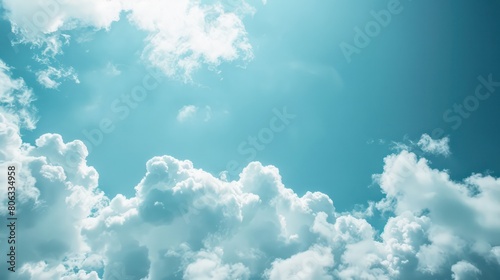 A vivid sky filled with fluffy cumulus clouds creating a dreamy backdrop, evoking freedom and lightness