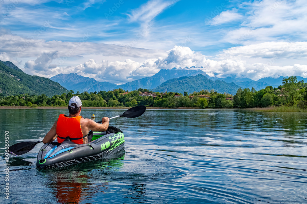 Canoeing scene on Lake Pusiano