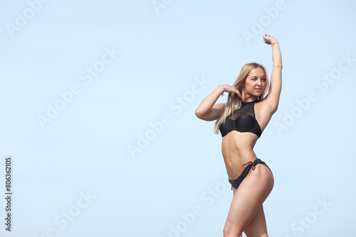 young woman in black swimsuit © zhagunov_a