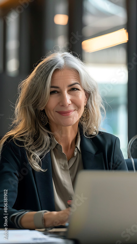 middle aged woman working on computer