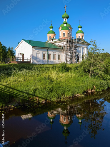Cathedral of the Smolensk icon of the Mother of God at the shore of Megrega river in Olonets, Republic of Karelia, Russia. The cathedral was built in 1824-1830. photo