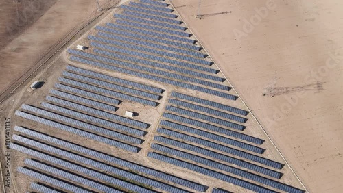 The image of the solar energy panels, which are one of the renewable energy sources and produce electricity, taken with a drone. photo