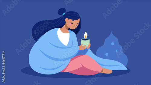 After a long day the soft girl unwinds by lighting a soothing scented candle and curling up in her fuzzy blanket..