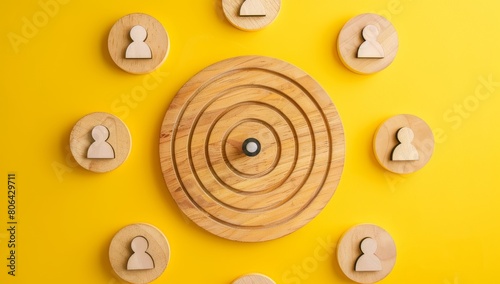 Sanium's target audience or customer group on a yellow background with human icons and a target board, depicting the business concept. photo