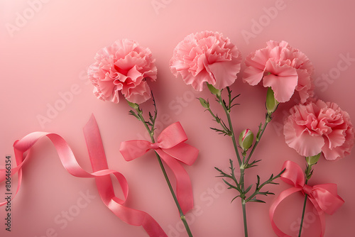 Elegant Carnations Basking in Soft Sunlight on a Peach Backdrop