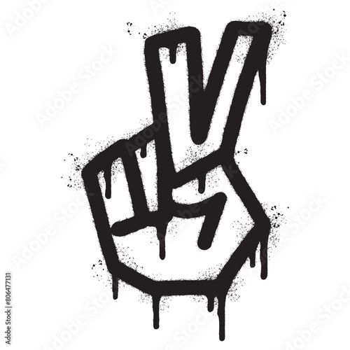 Spray Painted Graffiti Hand gesture V sign for victory icon Sprayed isolated with a white background. graffiti Hand gesture V sign for peace symbol with over spray in black over white.