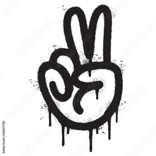 Spray Painted Graffiti Hand gesture V sign for victory icon Sprayed isolated with a white background. graffiti Hand gesture V sign for peace symbol with over spray in black over white.