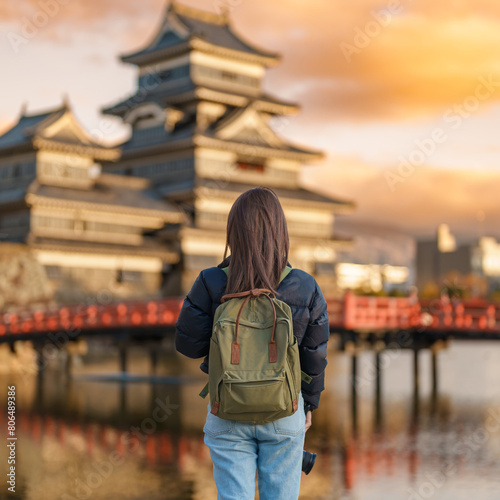 Woman tourist Visiting in Matsumoto  happy Traveler sightseeing Matsumoto Castle or Crow castle. Landmark and popular for tourists attraction in Matsumoto  Nagano  Japan. Travel and Vacation concept
