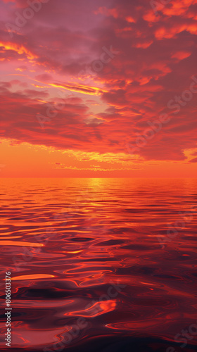 This breathtaking scene captures the tranquil beauty of a sunset over the ocean  as the sky blazes with vibrant shades of orange and red. Swirling clouds dance gracefully across the horizon