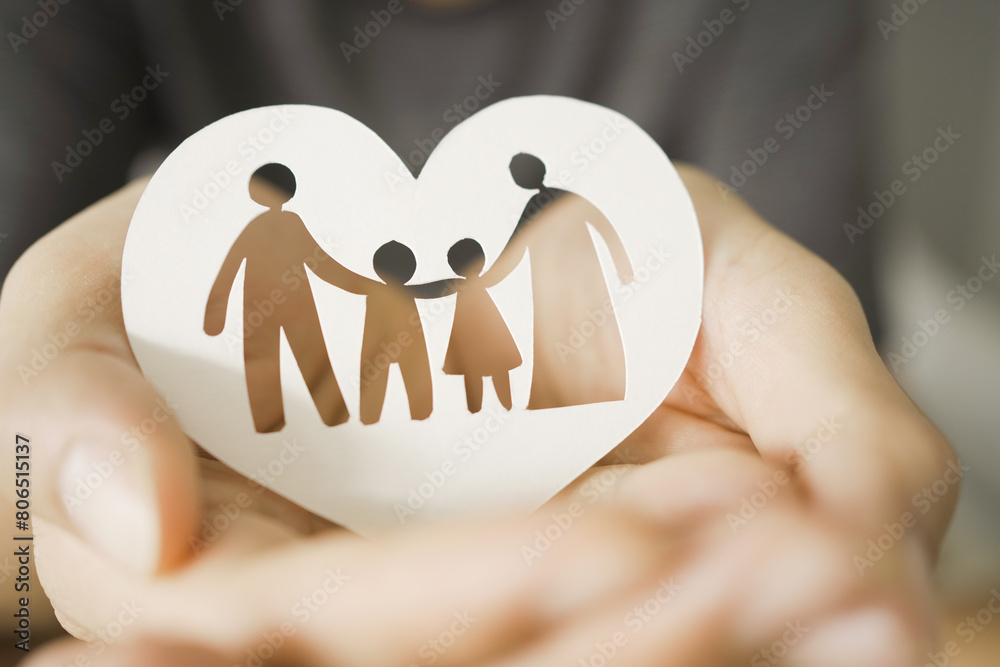 Φωτογραφία hands holding paper family cutout, foster care, homeless support, world mental h