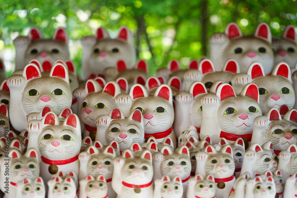 Manekineko or Waving Cat at Daikeizan Gotokuji temple in Tokyo, Japan - 日本 東京 大谿山 豪徳寺 招き猫