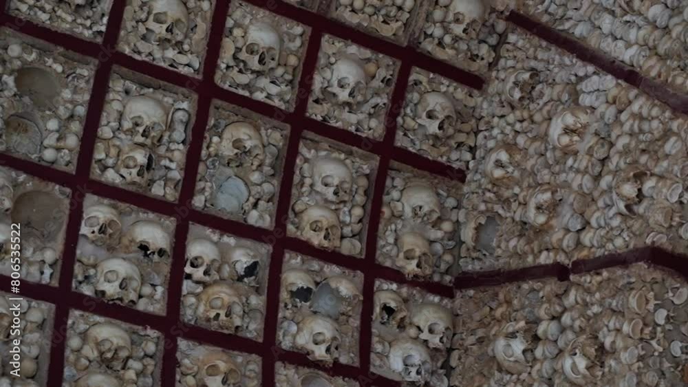 Capela dos Ossos (Bone Chapel) In Faro, Portugal; Exhumed Bones And Skulls Decorating The Chapel Wall. Capela dos Ossos (Bone Chapel) In Faro, Portugal; Exhumed Bones And Skulls Decorating The Chapel Wall.