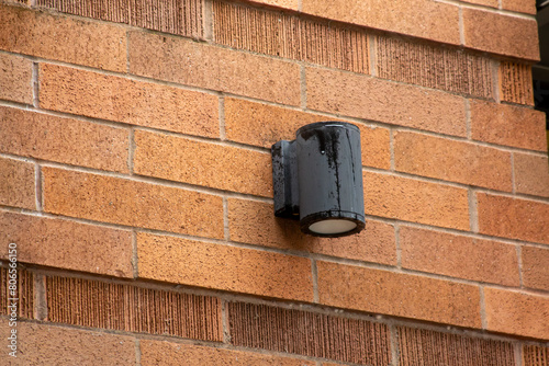 Light fixture on a brick wall