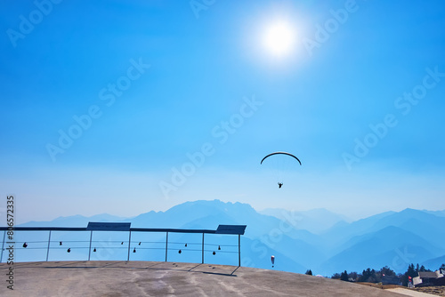 The glider aircraft in a blue sky, Cardada Cimetta, Ticino, Switzerland photo