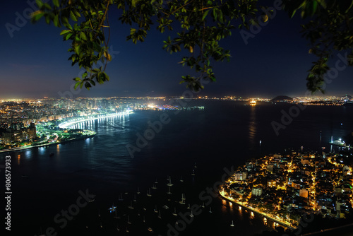 Guanabara Bay and Rio de Janeiro Skyline seen from Morro da Urca at Night - Brazil photo