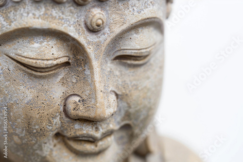 A serene Buddha statue with a peaceful expression and intricate details