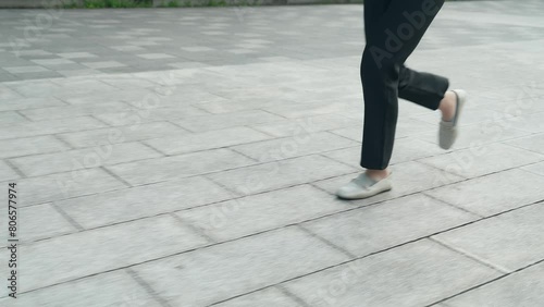 街を走る女性の足元 photo