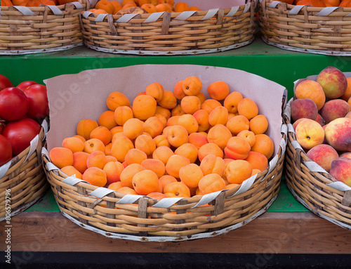 Basket of fresh ripe apricots at a local produce stand