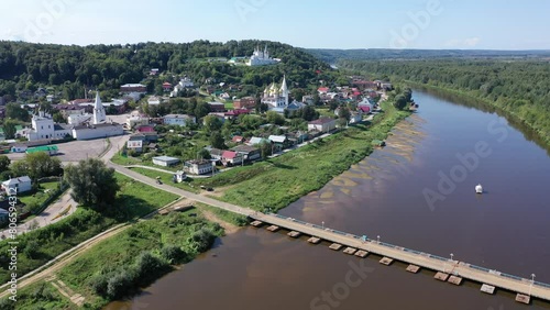 Bird's eye view of Russian town Gorokhovets. Residential buildings and Klyazma River visible form above. photo