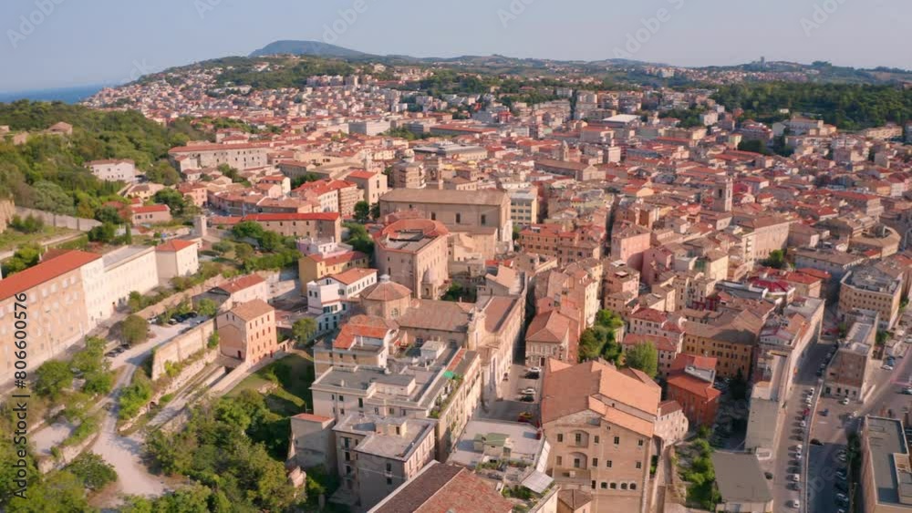 4K aerial - a bird's eye view video (Ultra High Definition) of Cattedrale di San Ciriaco church and San Gregorio Illuminatore - Catholic church. Stunning morning cityscape of Ancona town, Italy. 4K aerial - a bird's eye view video (Ultra High Definition) of Cattedrale di San Ciriaco church and San Gregorio Illuminatore - Catholic church. Stunning morning cityscape of Ancona town, Italy.