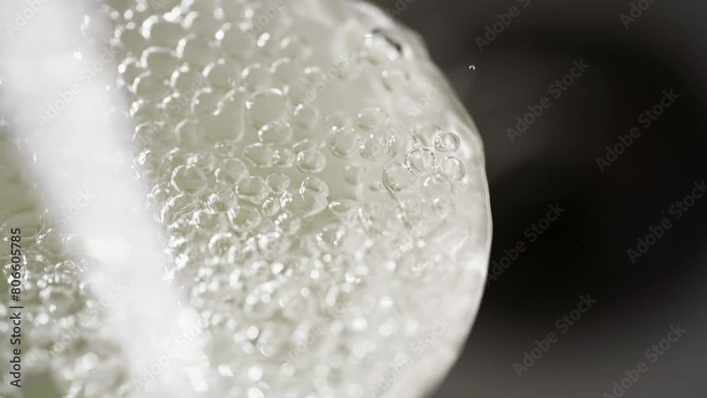 Close up macro of a running dripping tap. Water flowing and bubbling. Tap water silver kitchen fixtures, Close up macro of a running dripping tap. Water flowing and bubbling. Tap water silver kitchen fixtures,