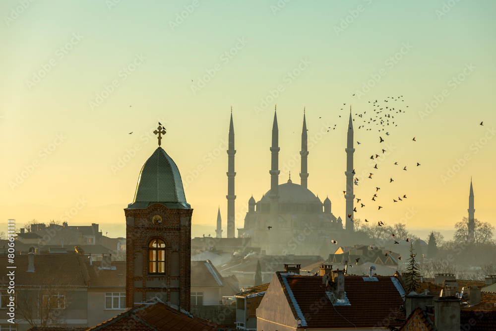 Naklejka premium Bulgarian Sveti George Church and Selimiye Mosque at sunset, Edirne, Turkey.