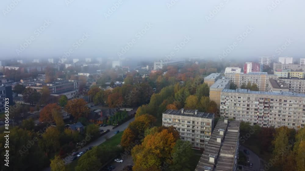 Drone Flight Above Apartment Buildings in Foggy Autumn in Riga Drone Flight Above Apartment Buildings in Foggy Autumn in Riga