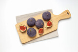Fresh ripe figs on a wooden board