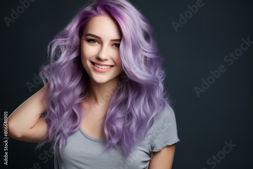 smiling woman with vibrant purple hair