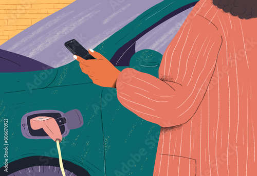 Woman using smart phone charging electric car